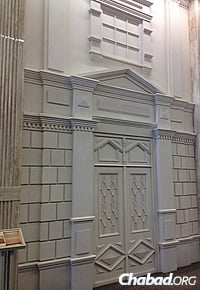 One of 12 facades of former synagogues in the city featured in a hallway in the Menorah Center.