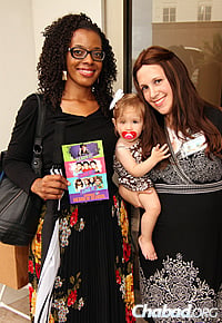 Teachers at the Chai Preschool Alexis Lewis, left, and Dini Druk, with her baby daughter. (Photo: Sonacity Productions)