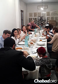 Guests partake in the meal before the start of Yom Kippur, the Jewish Day of Atonement and a fast day.