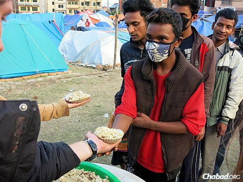 Chabad estimates that it prepared nearly 2,000 meals on Wednesday and will make even more on Thursday. (Photo: David Karsenty/Chabad of Nepal)