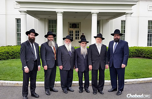 The delegation included, from left, Rabbi Meir Moscowitz; Rabbi Yossy Gordon; Rabbi Yisroel Shmotkin; Rabbi Abraham Shemtov; Rabbi Moshe Herson; and Rabbi Levi Shemtov.