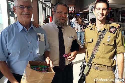 Raichik and Schack also deliver tefillin to male soldiers.