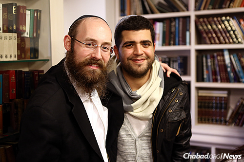 Rabbi Shneur Simcha Landa, who co-directs Chabad at Netanya Academic College in Israel, with a student there