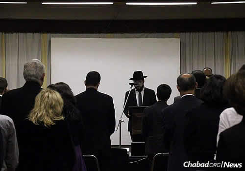 Rabbi Super speaks at a Holocaust memorial held at the Nairobi Jewish community's Vermont Hall, which sits within the Nairobi Hebrew Congregation's complex.