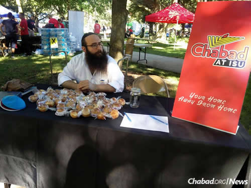 Rabbi Chaim Telsner has info (and items) at the ready about programs on campus.