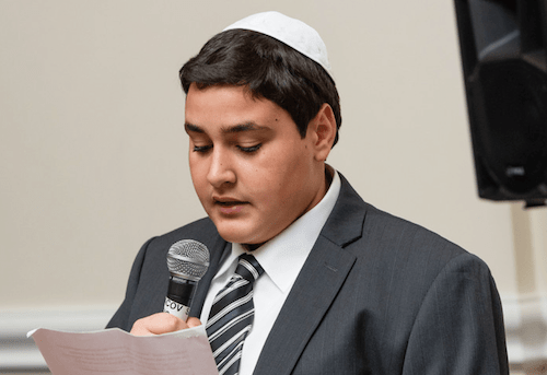A Bar Mitzvah boy giving a speech (Serraf Studio)