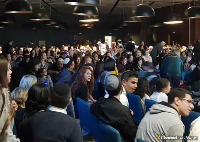 Hundreds attend a Chanukah menorah-lighting and event.