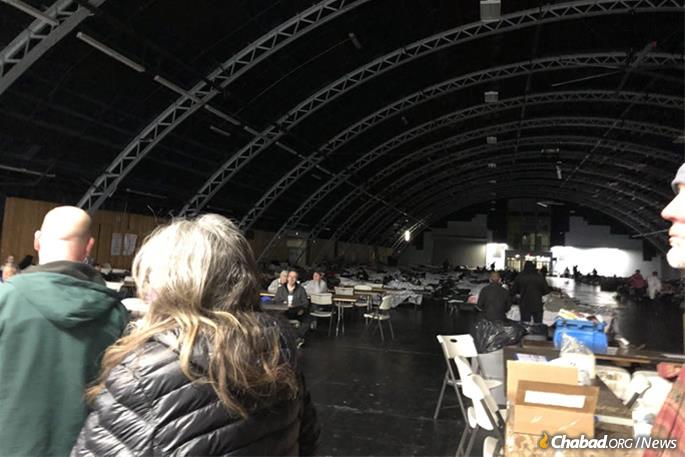 Cavernous shelters are housing tens of thousands of evacuees.