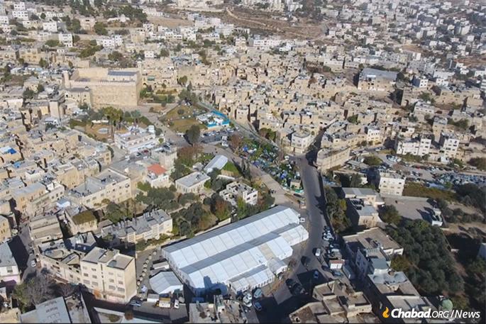 The cave, beneath in the large building upper left, is the main attraction in Hebron—one of Israel’s four holy cities—housing the sunken tombs of Adam and Eve, Abraham and Sarah, Isaac and Rebecca, and Jacob and Leah. Rachel is buried on the road to Bethlehem.