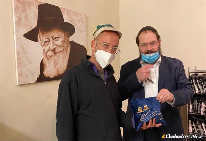 A scribe’s office in Brooklyn opened especially for the rabbi to purchase a brand-new pair of tefillin for Mendel.