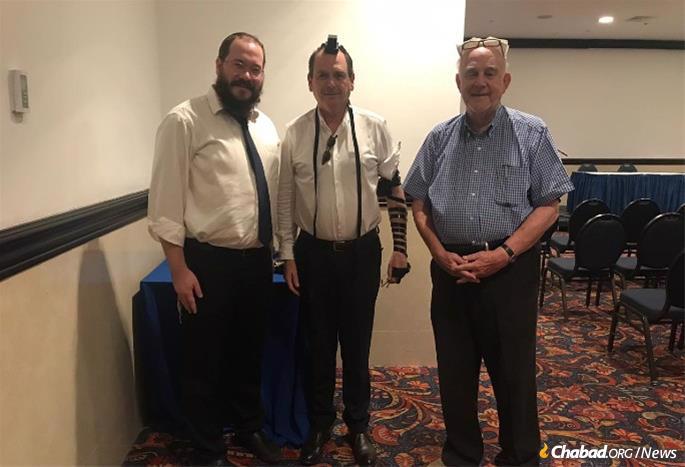 L-R: Rabbi Raskin, Israeli Ambassador Danny Biran and honorary consul Ainsley Henriques.