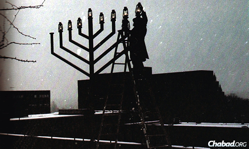 In the mid-1980s, Rabbi Yosef Landa of Chabad of Greater St. Louis kindles the menorah on the seventh night of Chanukah in the St. Louis county plaza.
