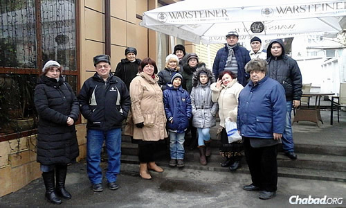 Jewish community members of Lugansk met in the city during Chanukah for a bit of a reprieve.