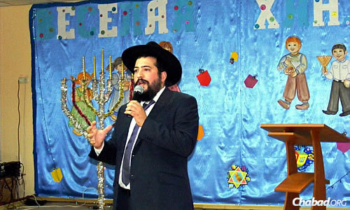 Rabbi Mendel Cohen, rabbi of Mariupol, Ukraine, and co-director of Chabad there with his wife, Ester, did not hold an outdoor public menorah-lighting this year, but did host numerous holiday events for all age groups.