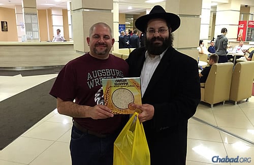 Minnesota native David Nathanson, who's on the U.S. curling team, gets some shmurah matzah for Passover.