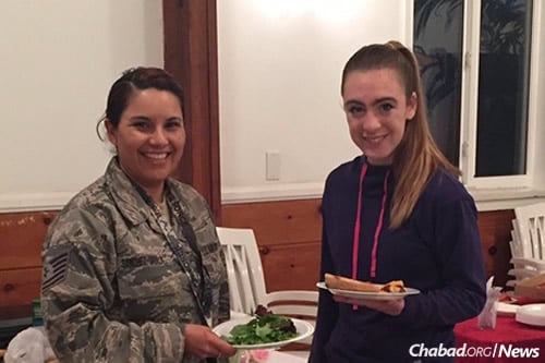 Isabel Savala, civil operations specialist of the Counter Drug Task Force, with Reilly Friedman, 14